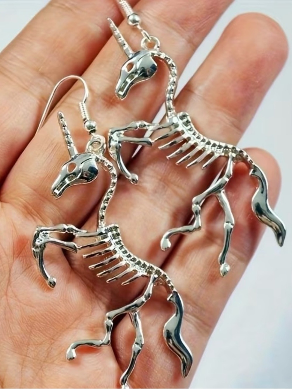 Silver Tone Unicorn Skeleton Dangle Earrings